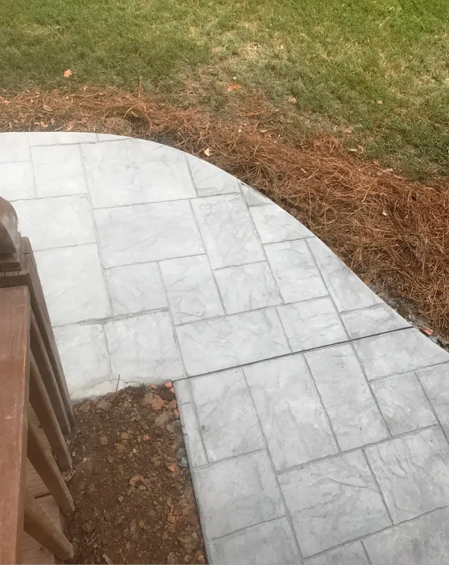 A path made from grey stamped concrete