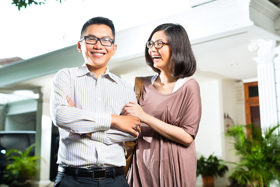 Smiling couple showing their satisfaction